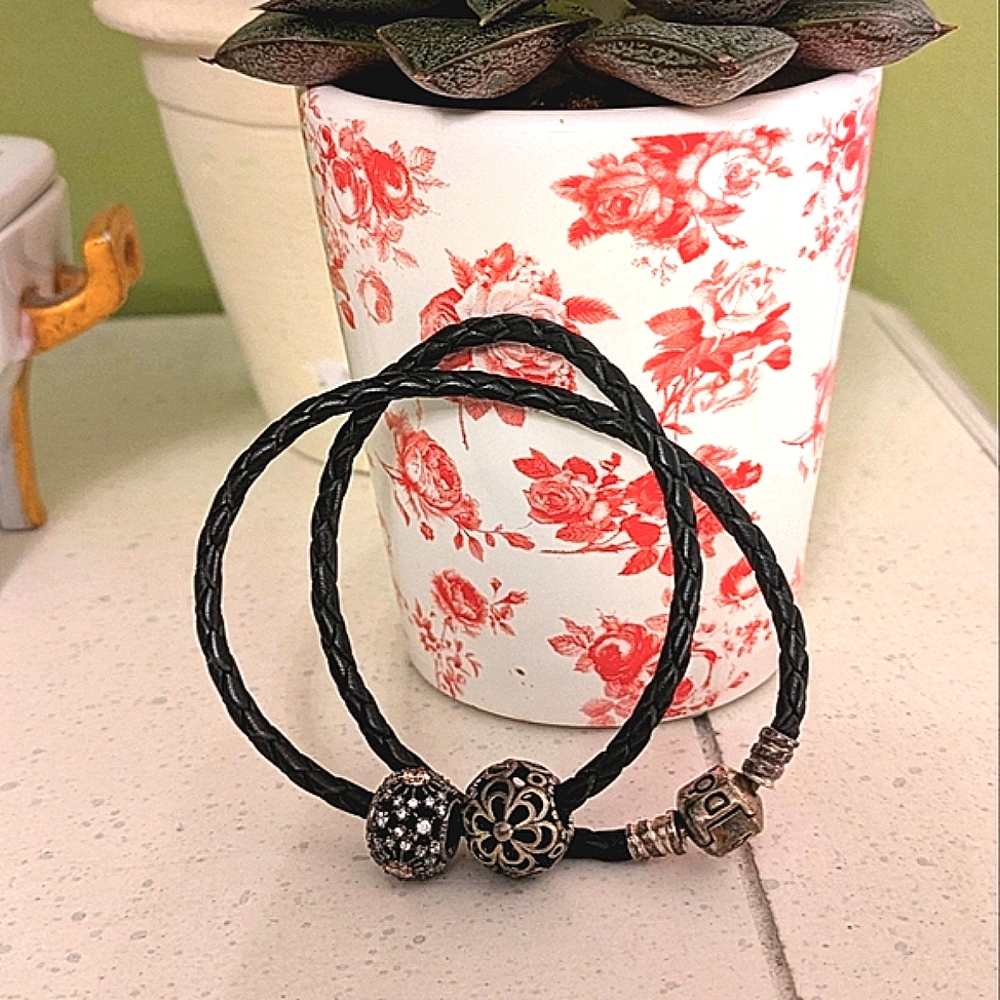 Pandora leather bracelet with two charms